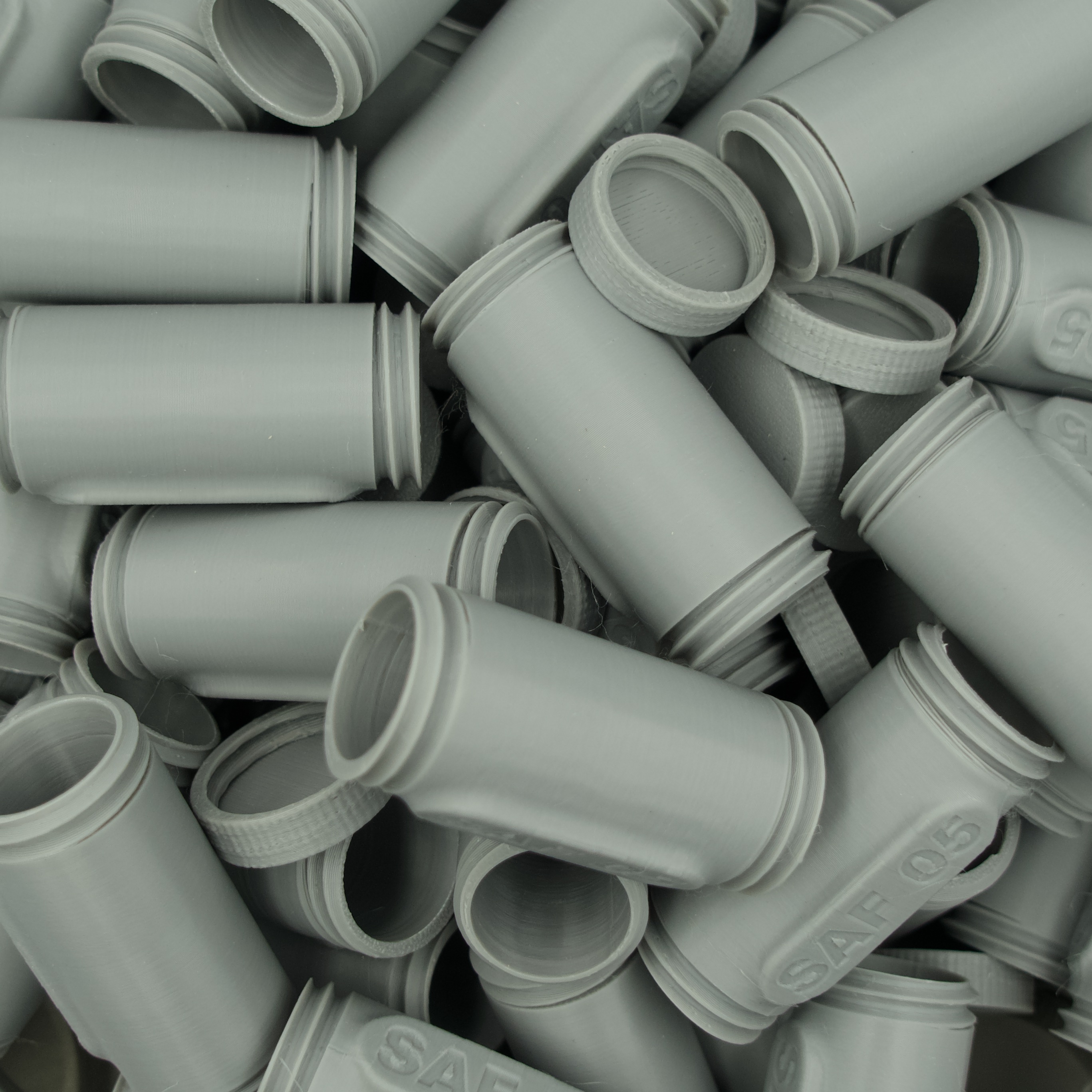 A collection of 3D printed parts representing batch production